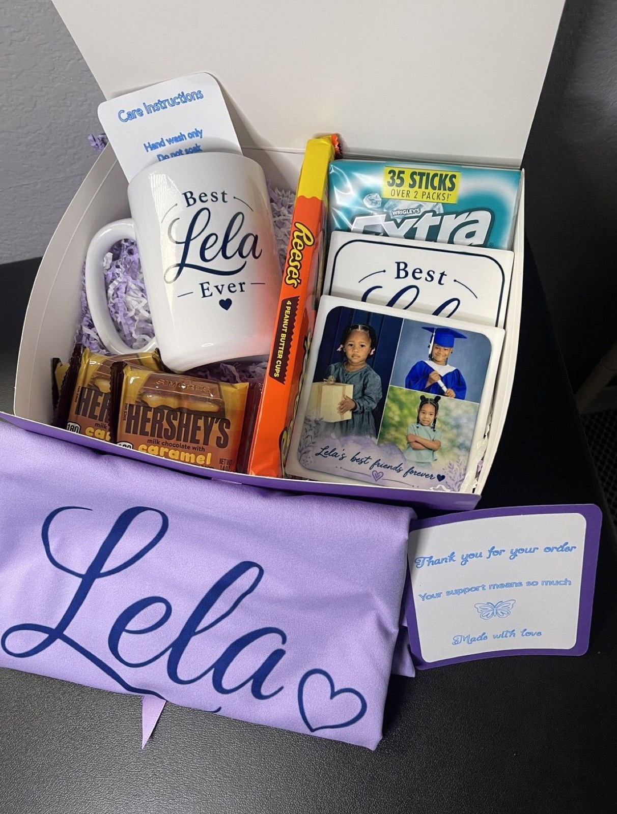 Completed Soft Touch Creations gift box with personalized mug, photo coasters, custom shirt, candy, care card and handwritten thank-you note